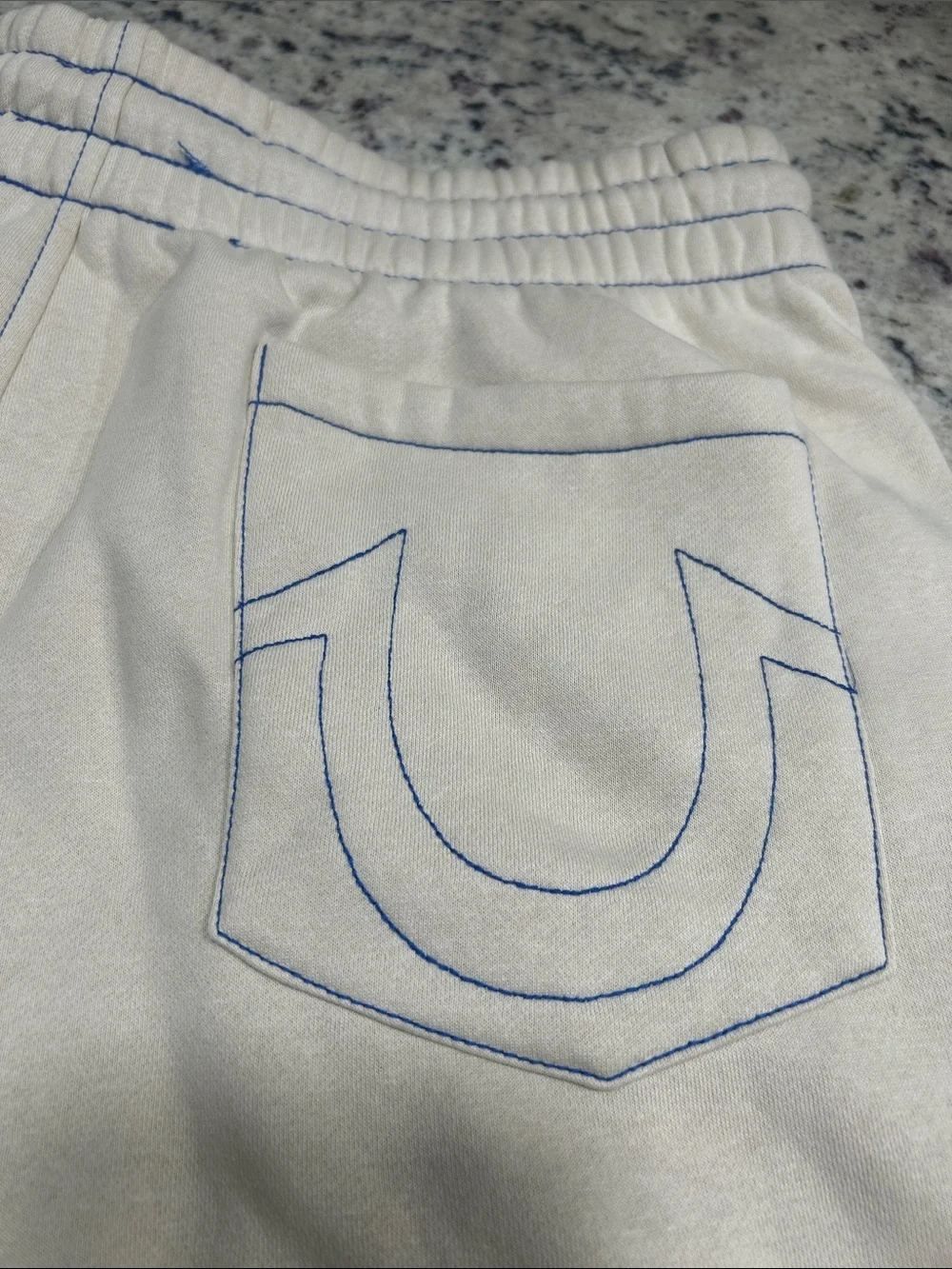 True Religion Cream Shorts with Blue Drawstring and Trim